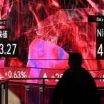 Global stocks slide as Middle East tensions drive oil higher